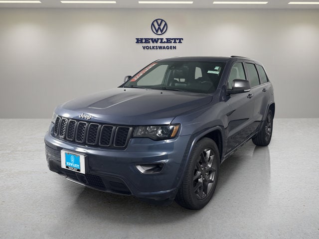 2021 Jeep Grand Cherokee 80th Anniversary in Slate Blue Pearlcoat — front three-quarter view
