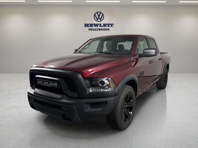 2024 RAM 1500 Classic Warlock in Delmonico Red Pearlcoat — front three-quarter view