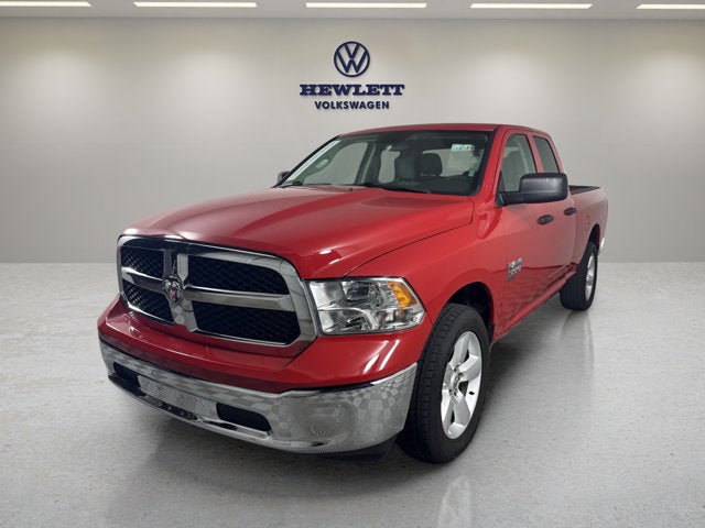2024 RAM 1500 Classic SLT in Flame Red Clearcoat — front three-quarter view