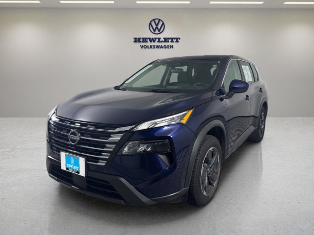 2025 Nissan Rogue SV in Deep Ocean Blue Pearl — front three-quarter view