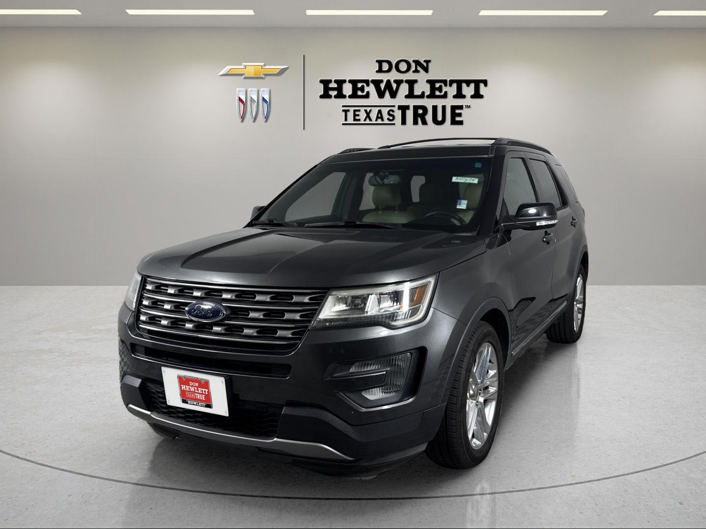 2017 Ford Explorer XLT in Gray — front three-quarter view