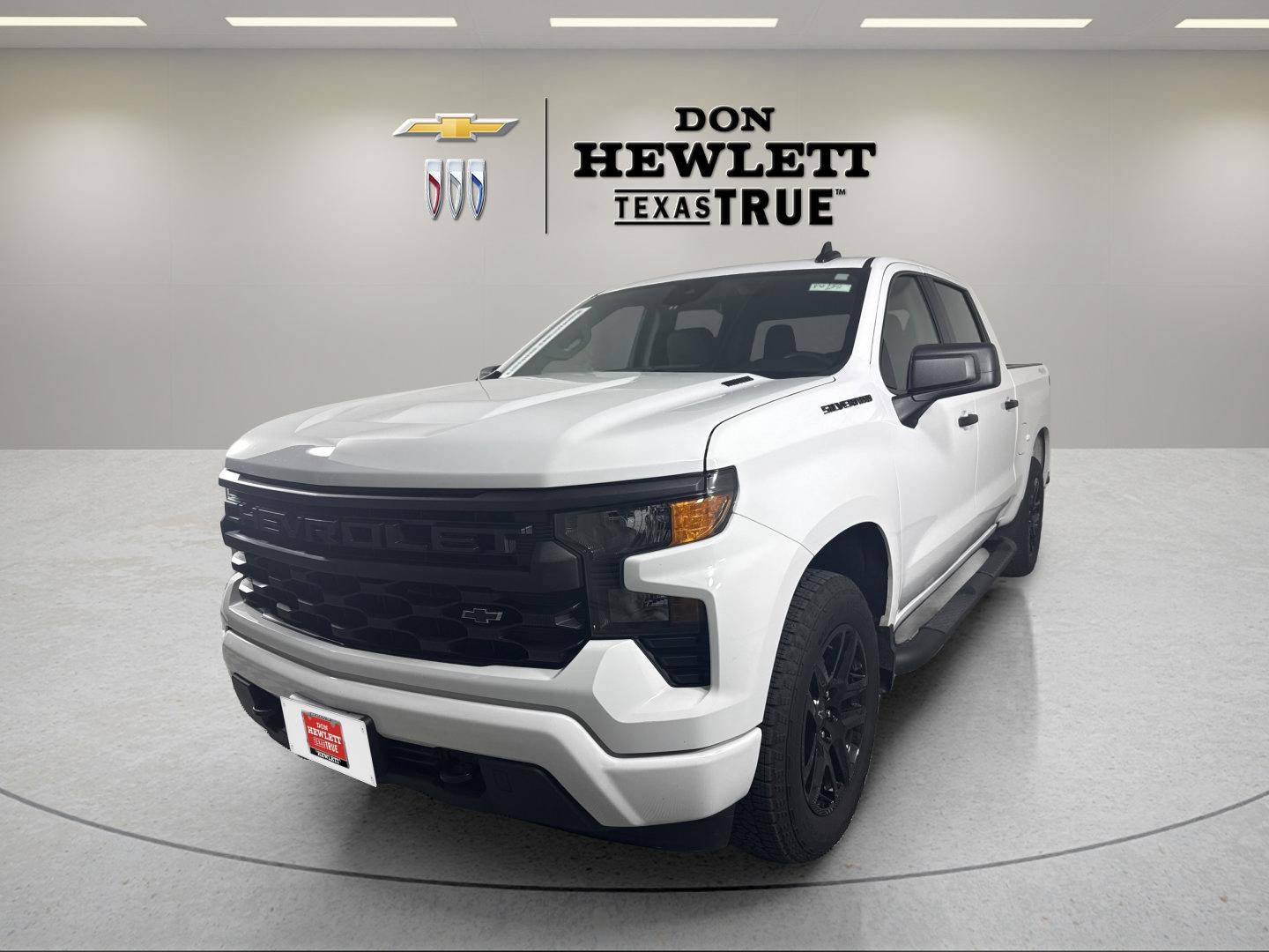 2026 Chevrolet Silverado 1500 Custom in Summit White — front three-quarter view