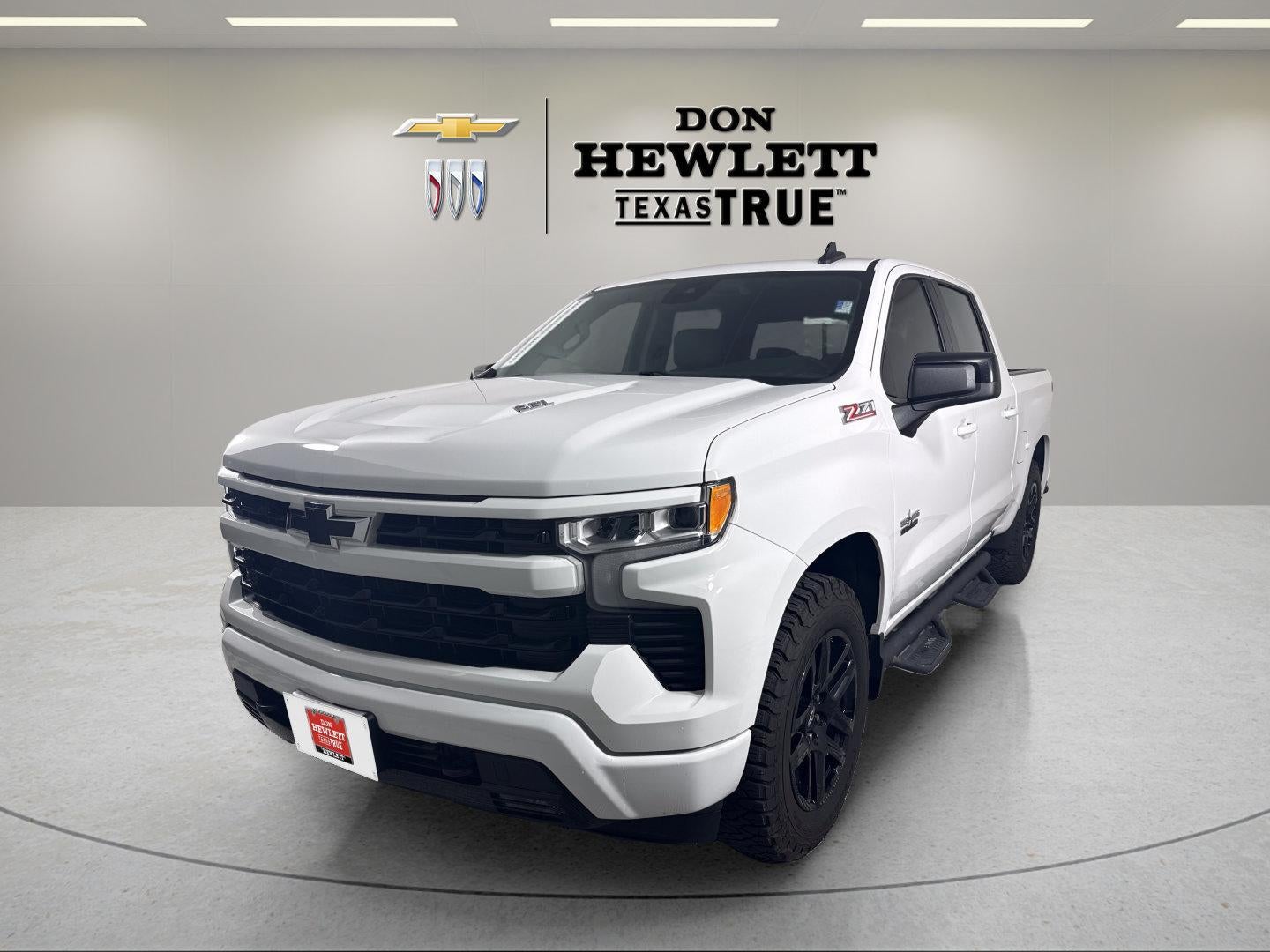 2023 Chevrolet Silverado 1500 RST in Summit White — front three-quarter view