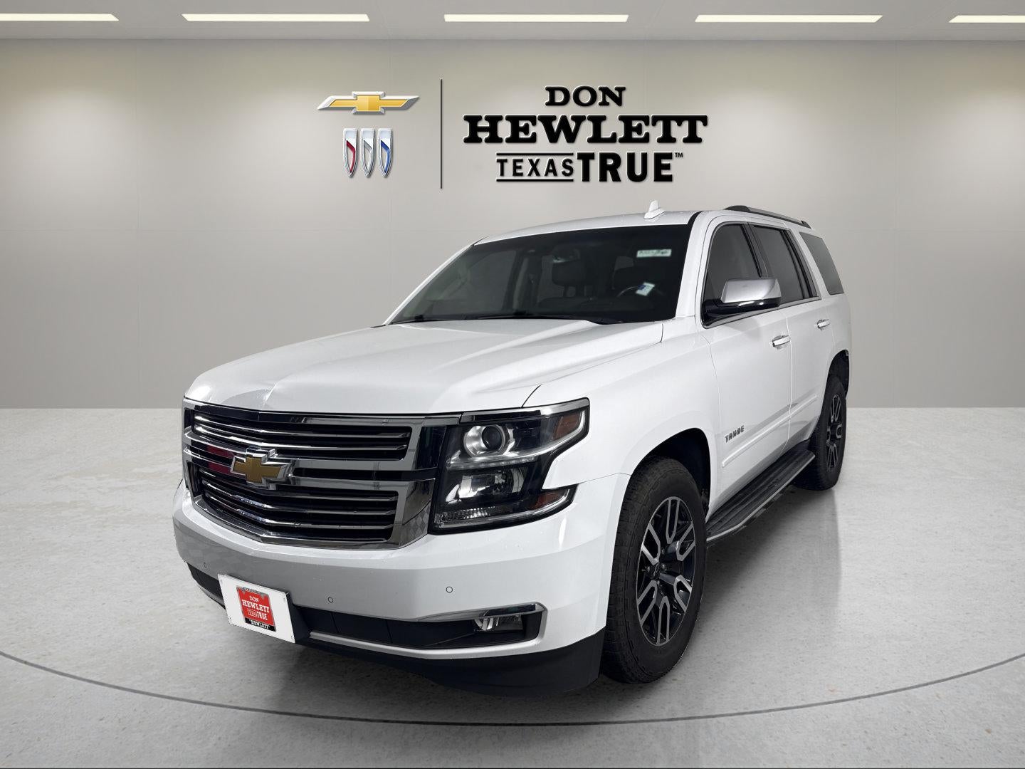 2017 Chevrolet Tahoe Premier in Summit White — front three-quarter view