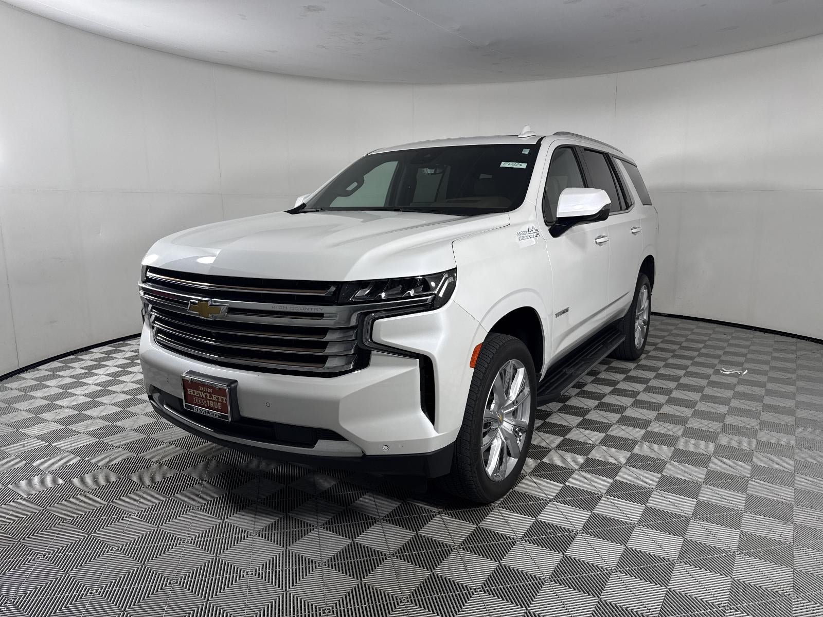 2024 Chevrolet Tahoe High Country in Iridescent Pearl Tricoat — front three-quarter view