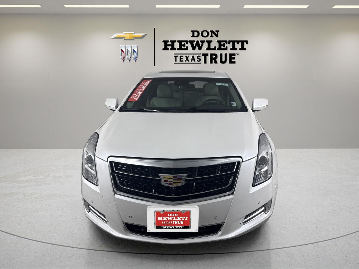 2016 Cadillac XTS Luxury Collection in Crystal White Tricoat — front three-quarter view