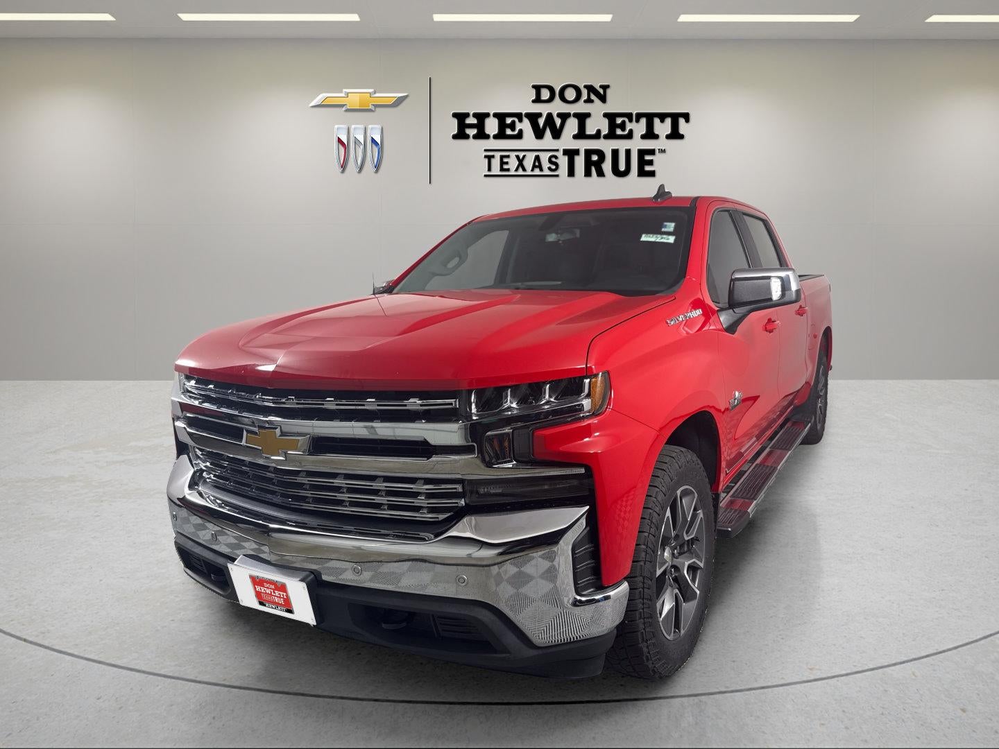 2021 Chevrolet Silverado 1500 LT in Red Hot — front three-quarter view