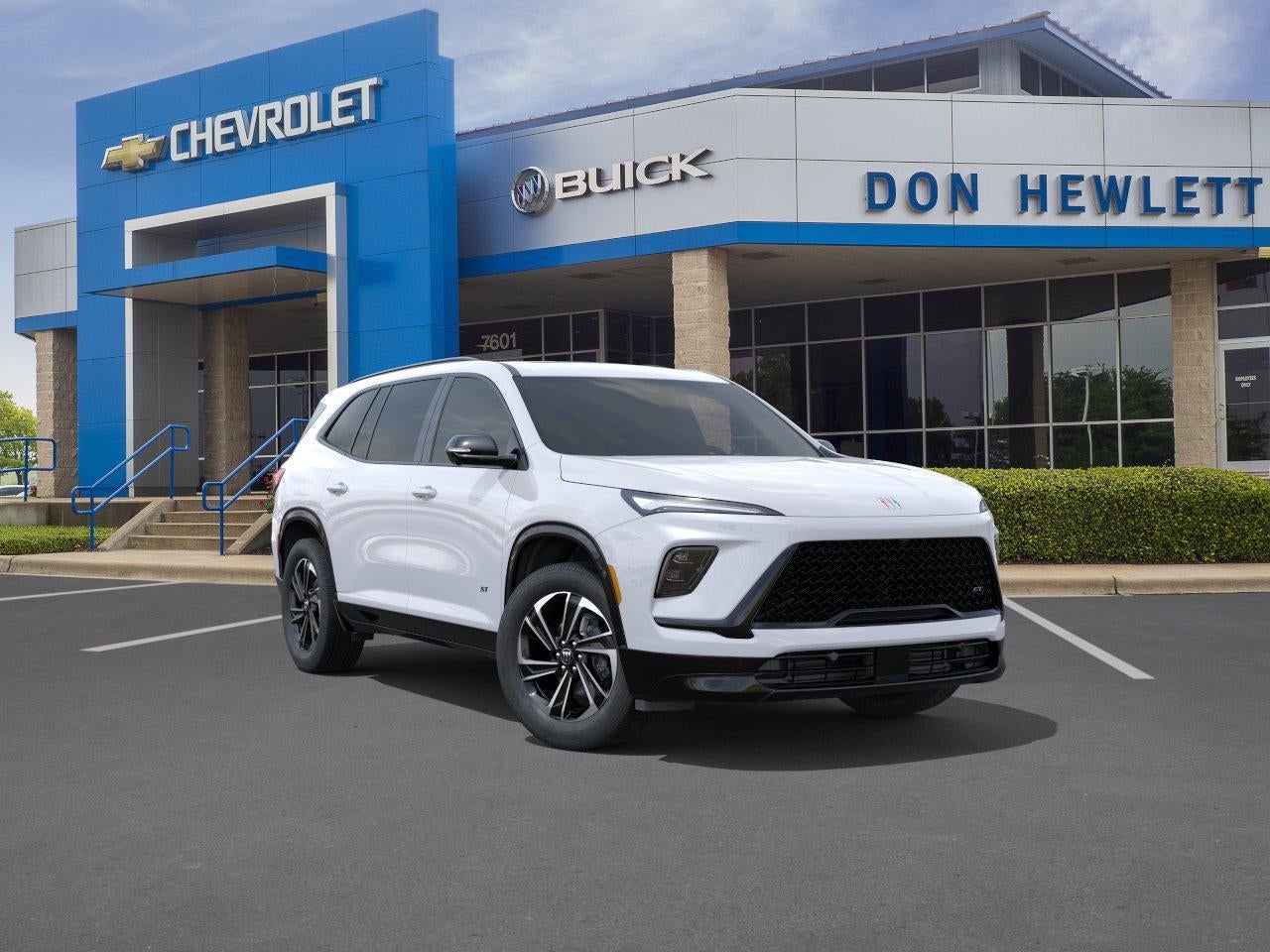 2026 Buick Enclave Sport Touring in Summit White — front three-quarter view