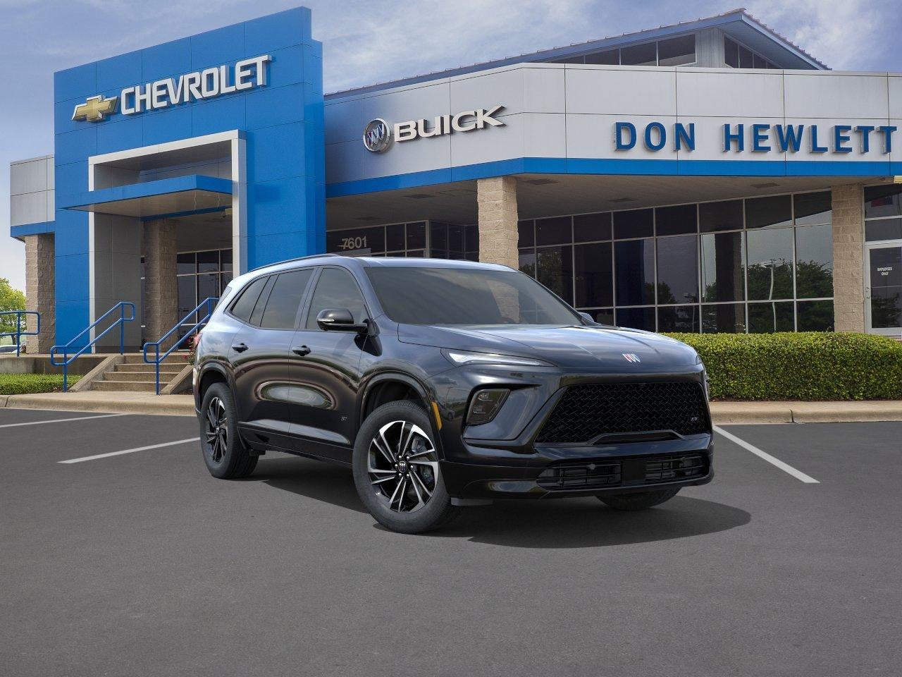 2026 Buick Enclave Sport Touring in Ebony Twilight Metallic — front three-quarter view