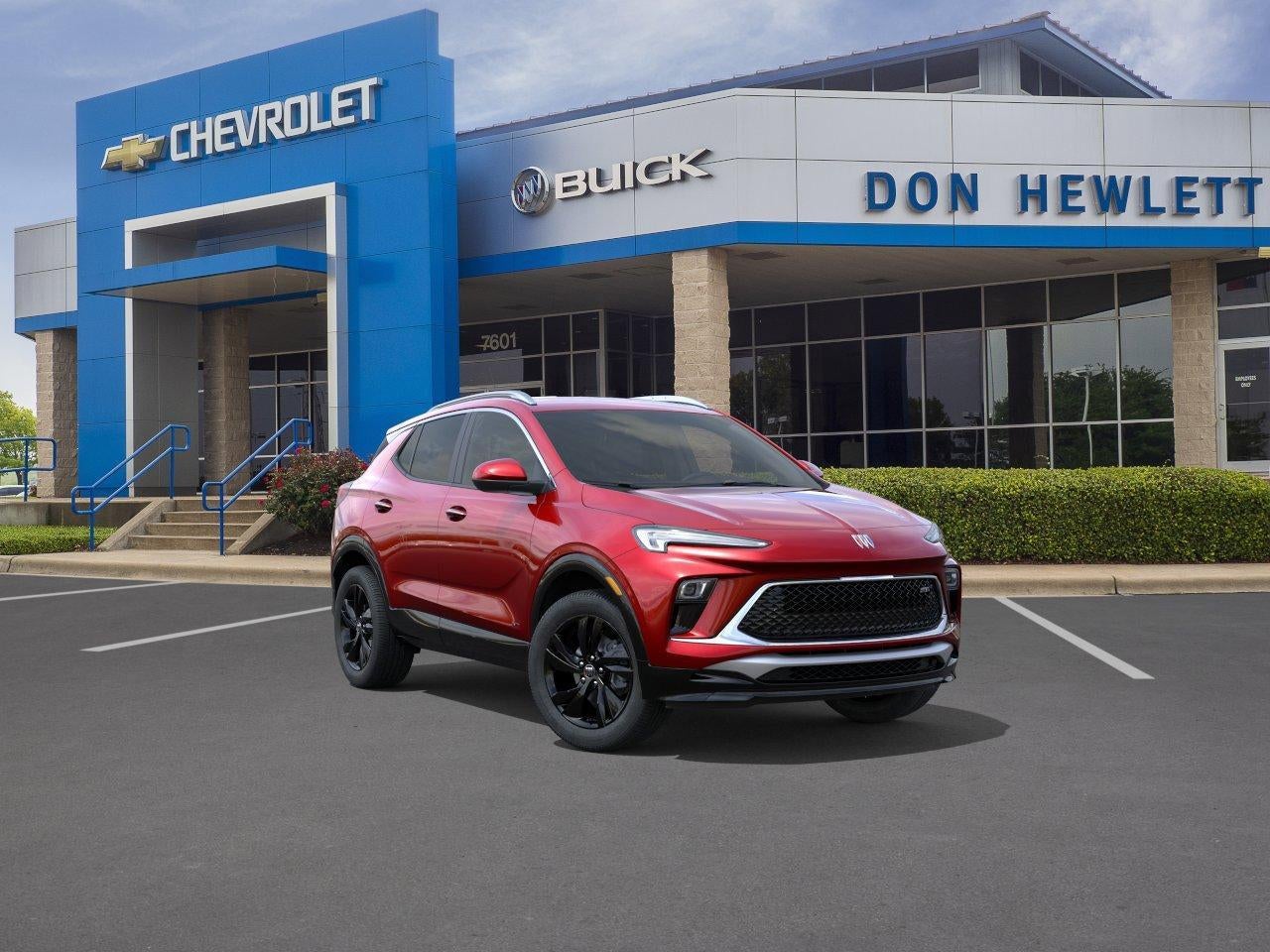 2026 Buick Encore GX Sport Touring in Brilliant Red — front three-quarter view