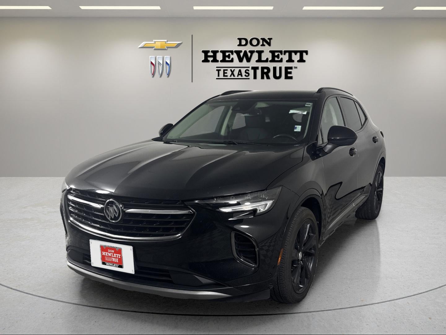 2021 Buick Envision Preferred in Ebony Twilight Metallic — front three-quarter view