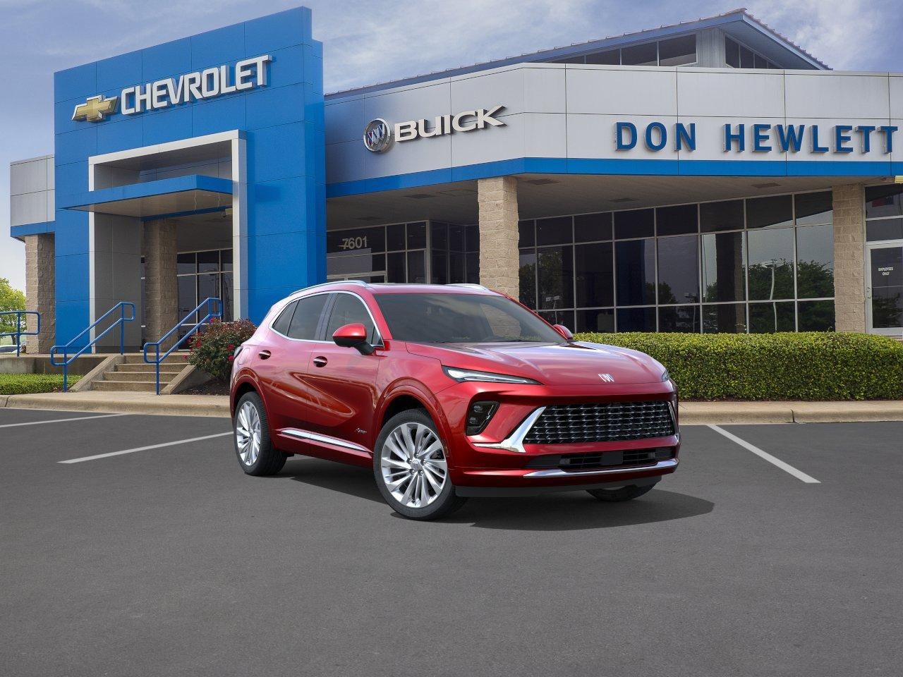 2026 Buick Envision Avenir in Brilliant Red — front three-quarter view